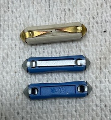 Actual fuses - top fuse is the old style ceramic.  Blue fuses are plastic